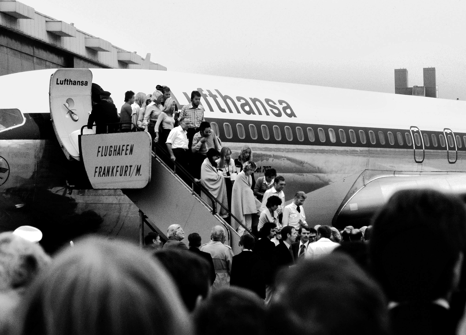 On October 18, 1977, the passengers of the  hijacked “Landshut” arrive back in Frankfurt  aboard a Boeing B707.