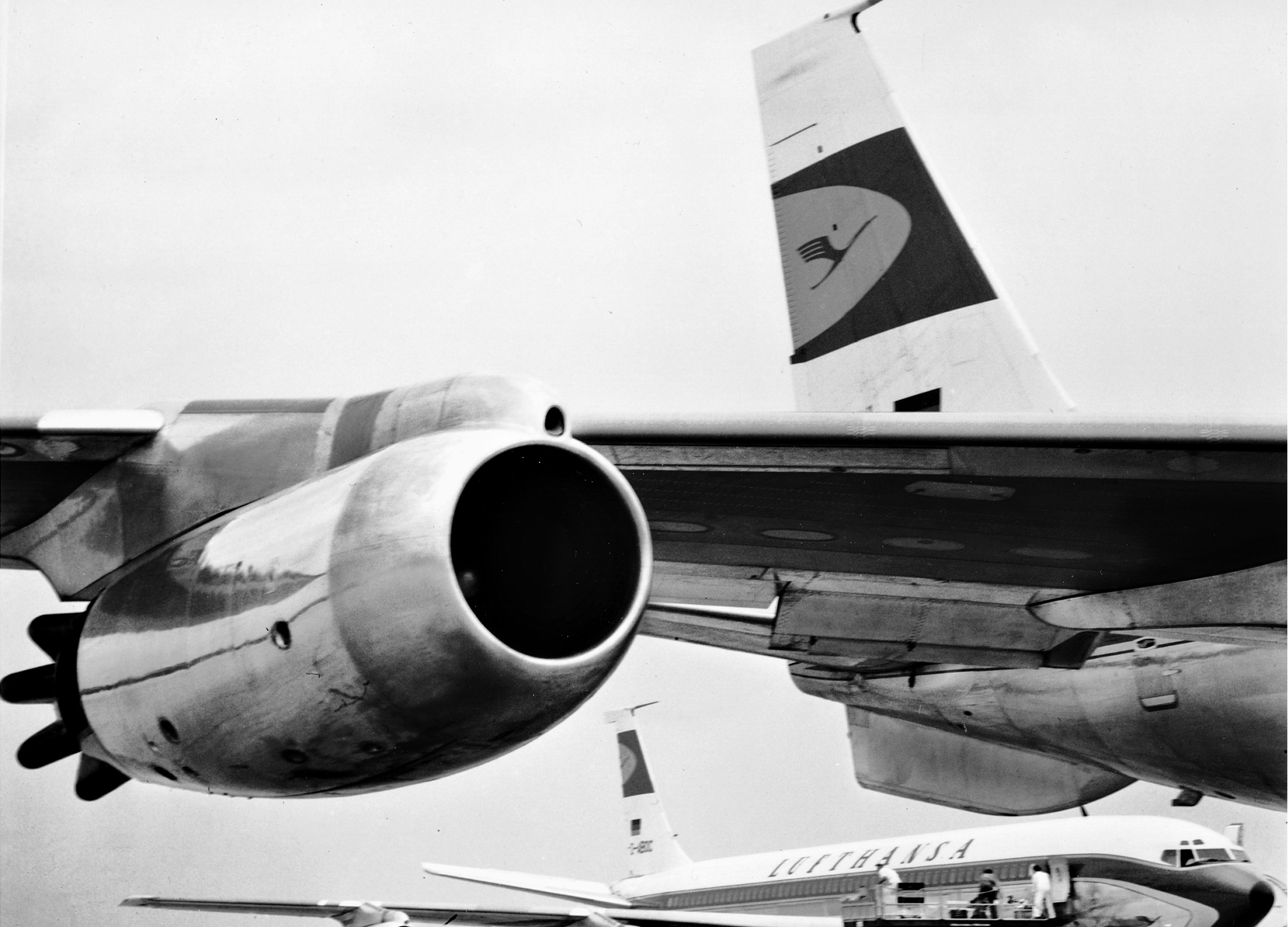 Two generations of technology: propeller and jet aircraft.