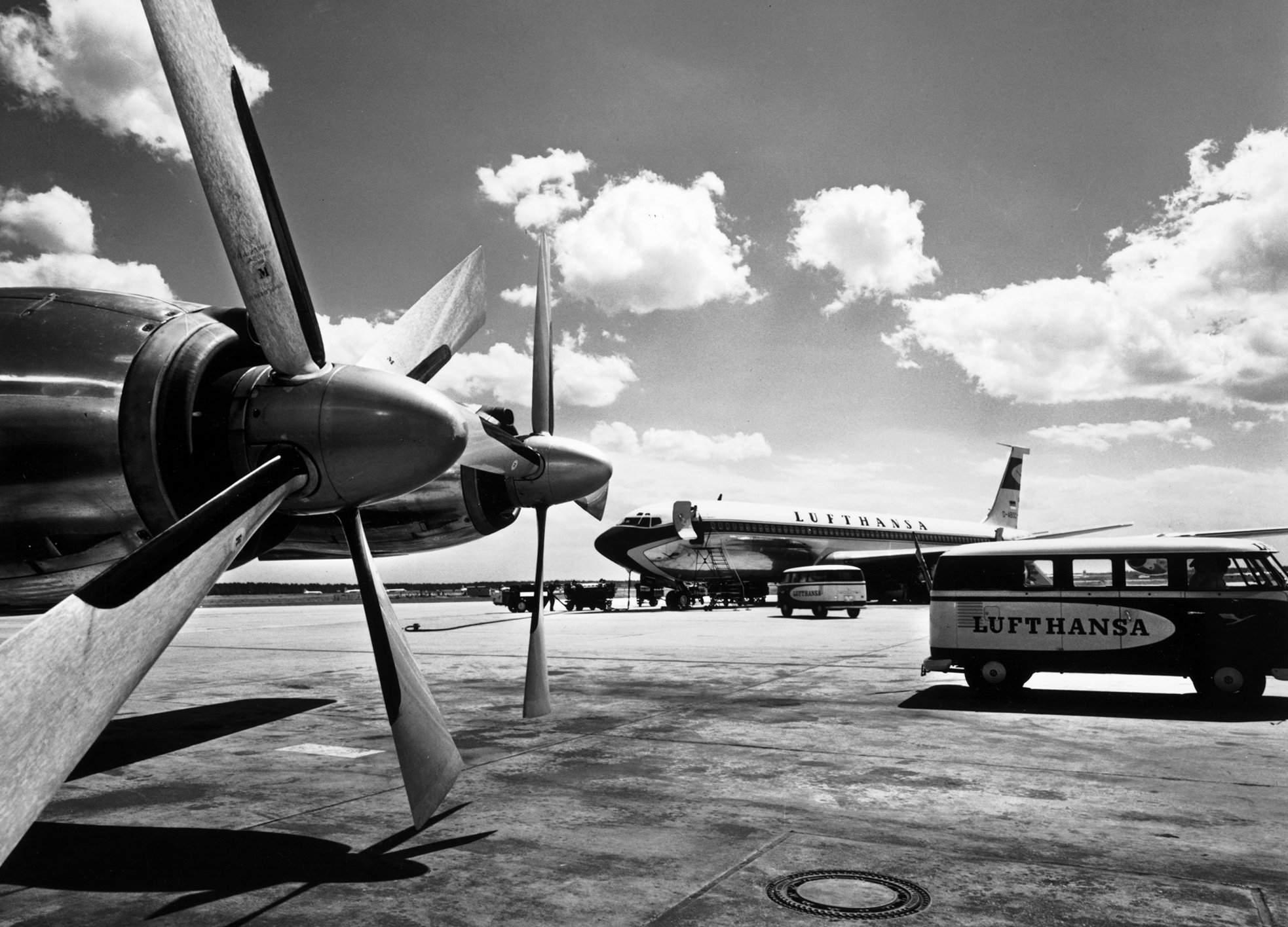 Two generations of technology: propeller and jet aircraft.