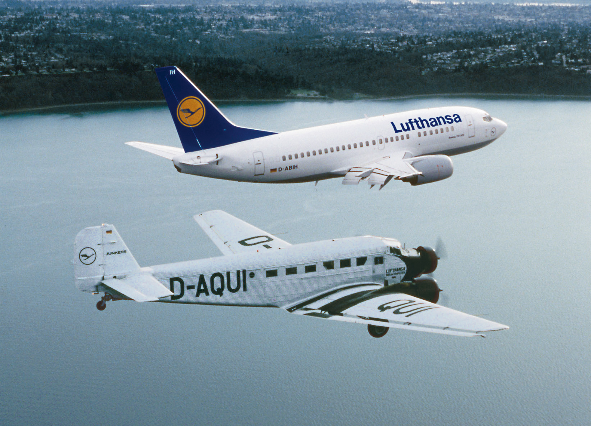 The 20th century turned the dream of flying into a  reality: a Boeing B737-500 flying in formation with the Junkers Ju 52 of Deutsche Lufthansa Berlin-Stiftung.